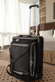 first class carry-on duffel black in hotel